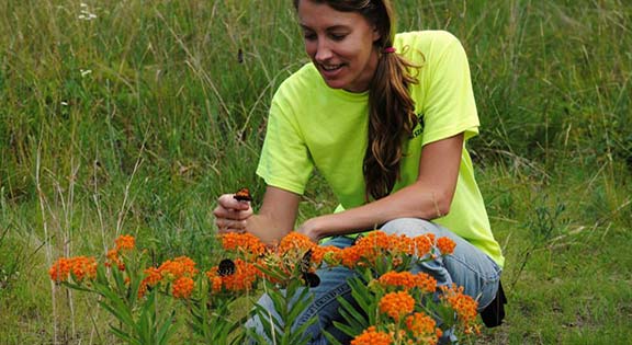 Woman holding butterfly